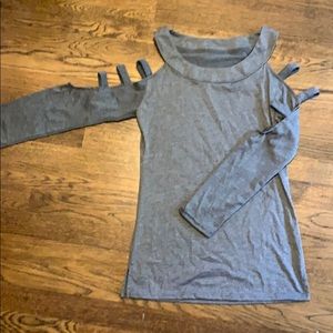 Long sleeved shirt with shoulder cut outs